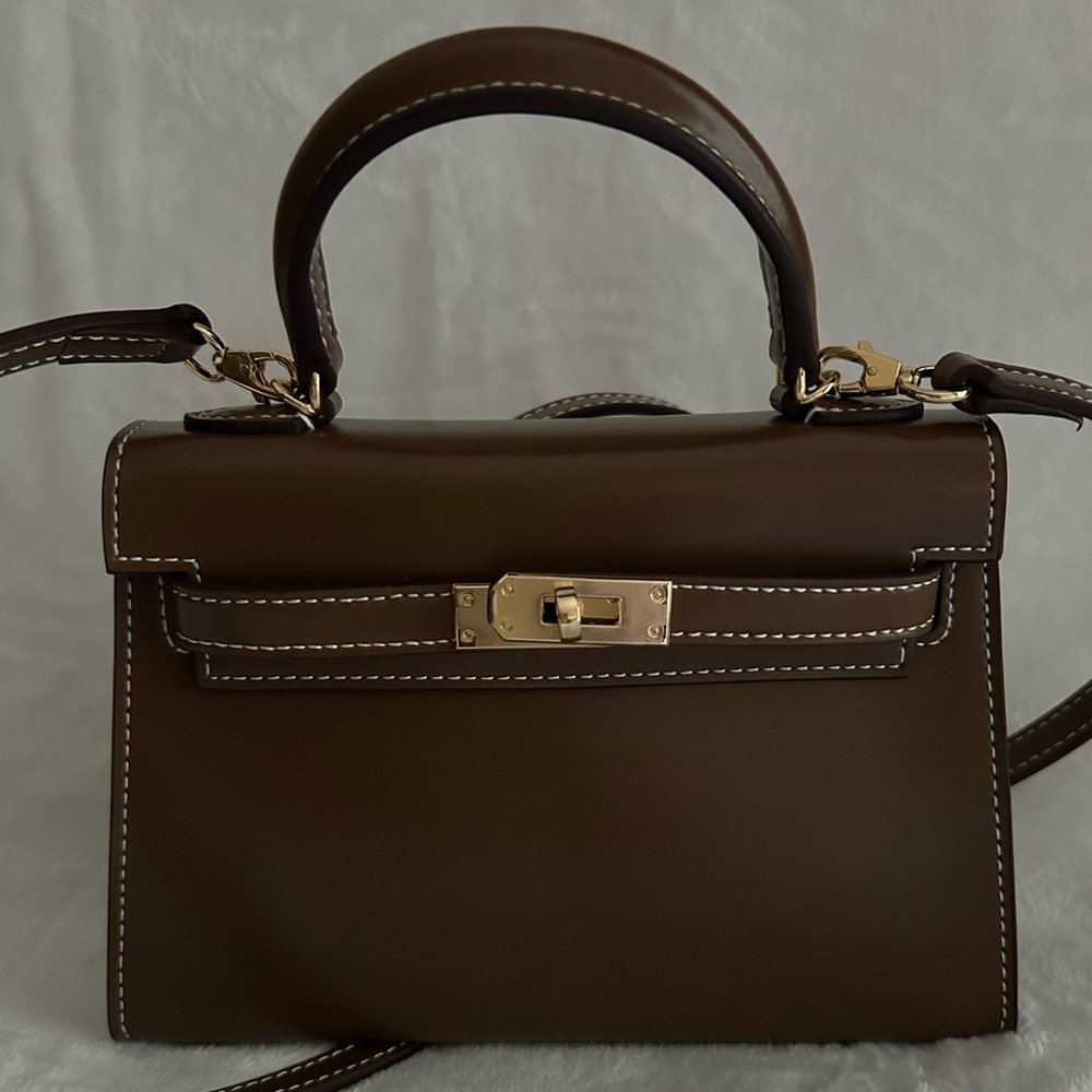 Brown leather mini “Kelly” inspired handbag.